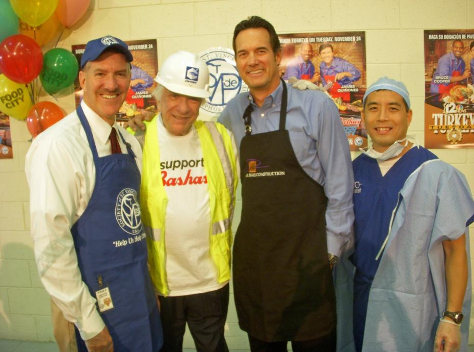 group of men smiling at the camera