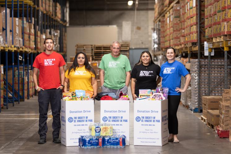 SVdP staff in food bank