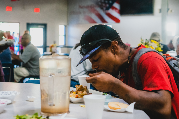 100-days-food-no-logo Man eating food at a St. Vincent de Paul dining room
