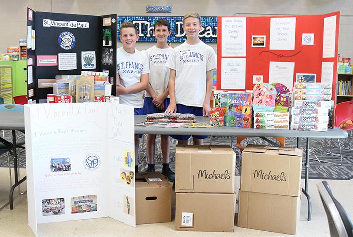 St. Francis Xavier students pose for a photo in the Dream Center.