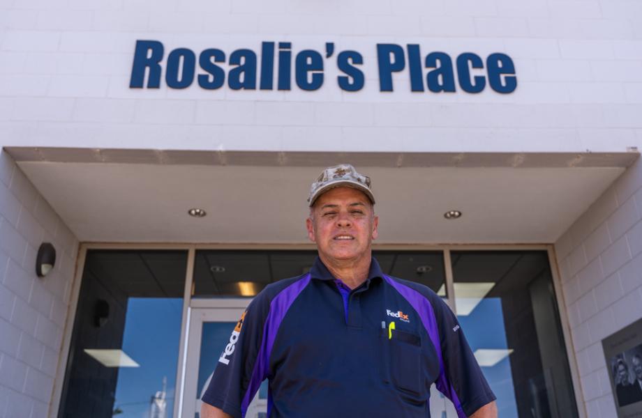 Roberto stands outside his former shelter, Rosalie's Place.