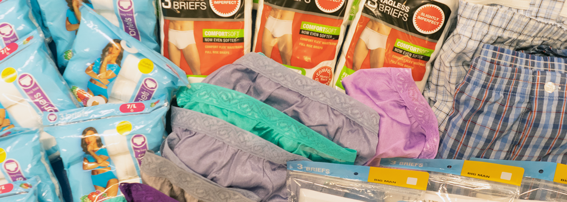 drop-drawers-header stack of men's and women's underwear