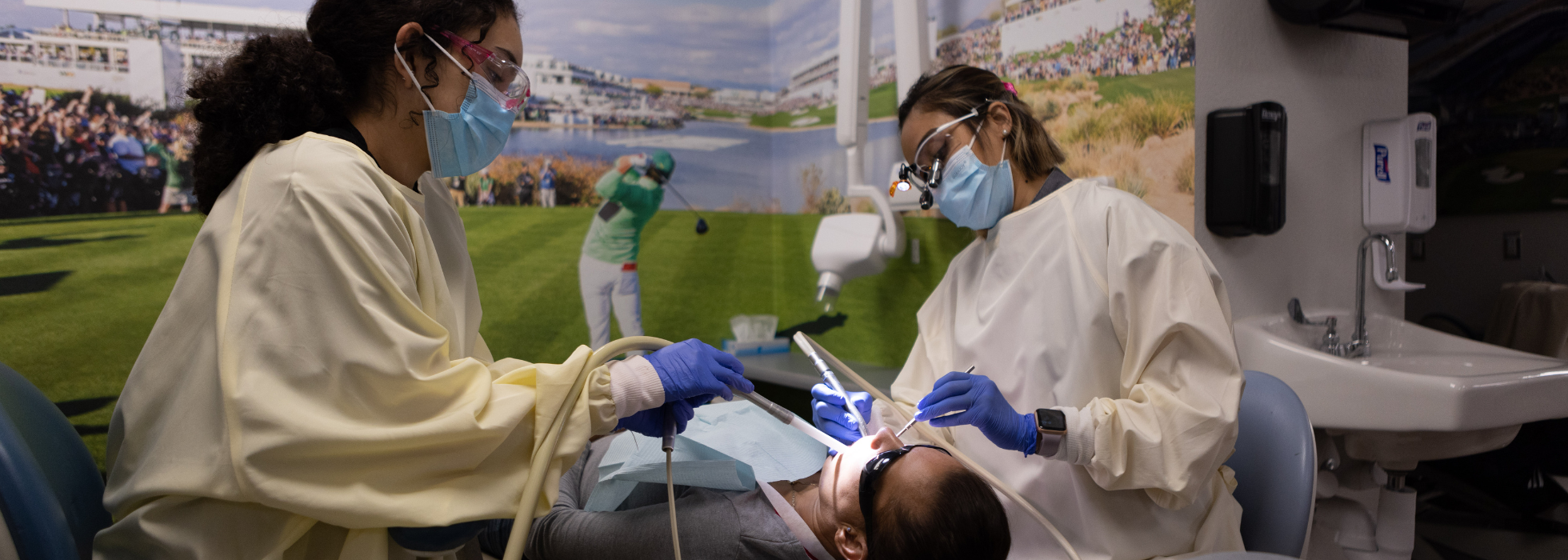 dental clinic campaign header two dentists working on a patients