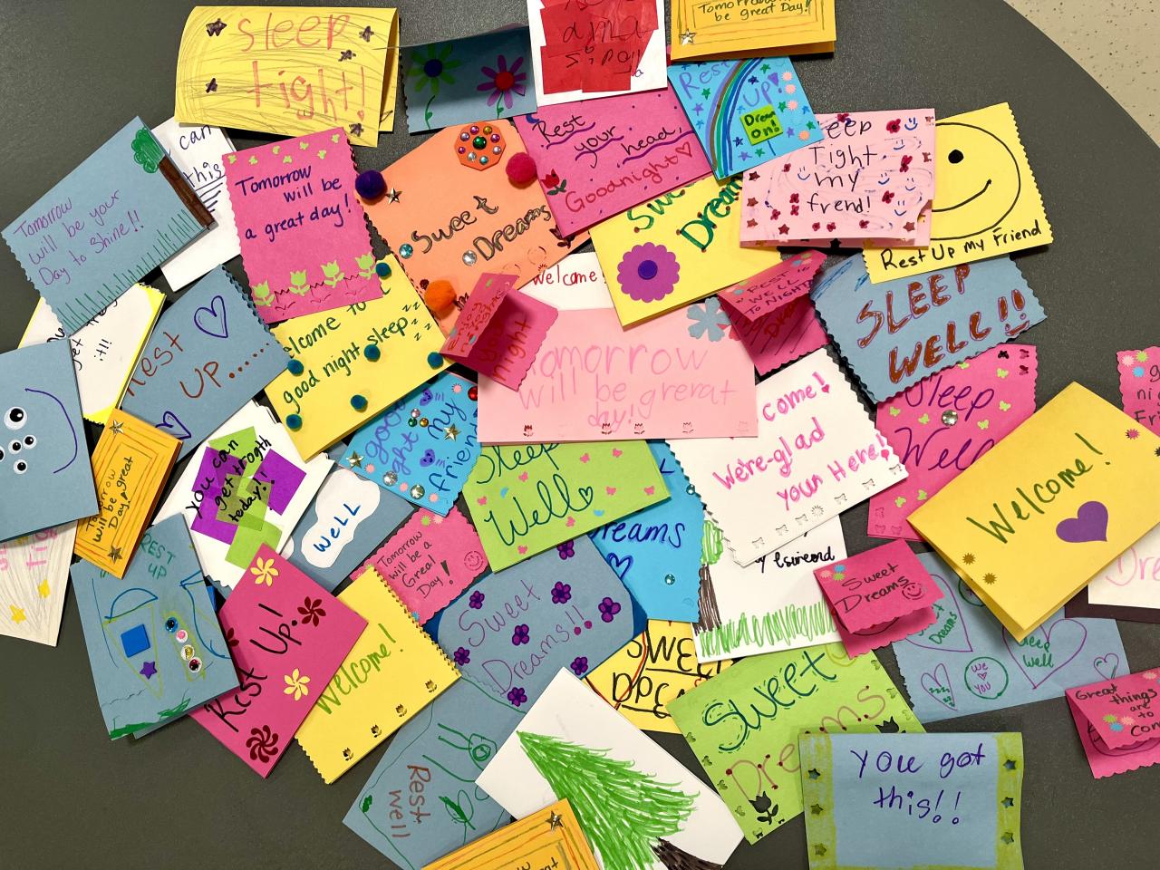 Handmade cards laid out on a table