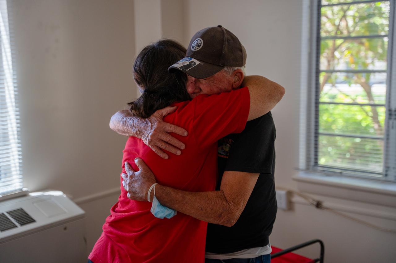 Bill hugs Julie