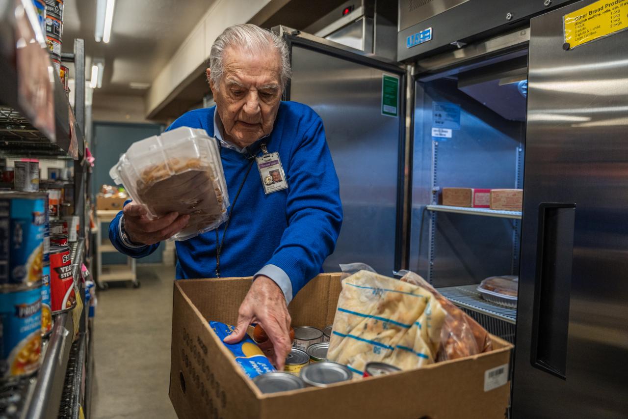 Santé serving at the Sacred Heart food pantry in Prescott, Ariz.