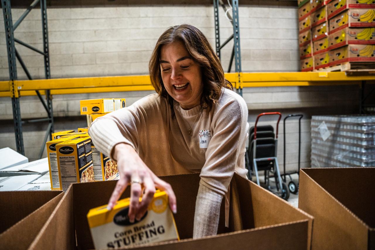 volunteer and food box