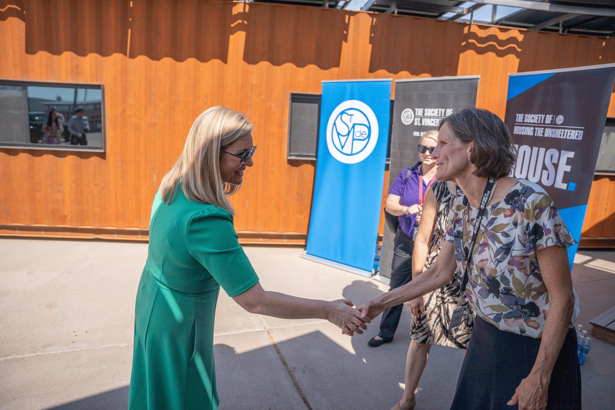 SVdP Rob & Melani Walton Endowed CEO Shannon Clancy welcomes Phoenix Mayor Kate Gallego during the open house