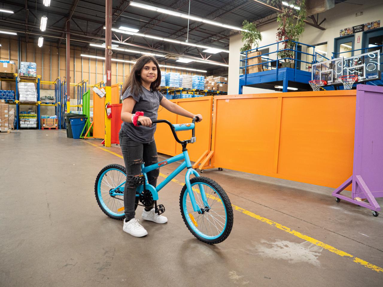 Girl in bike shop