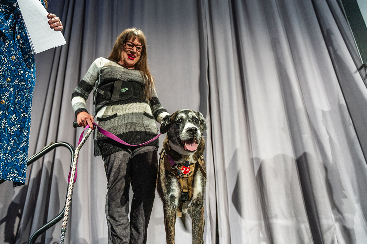 Interim Housing Graduate DD Brown and her dog Cocoa