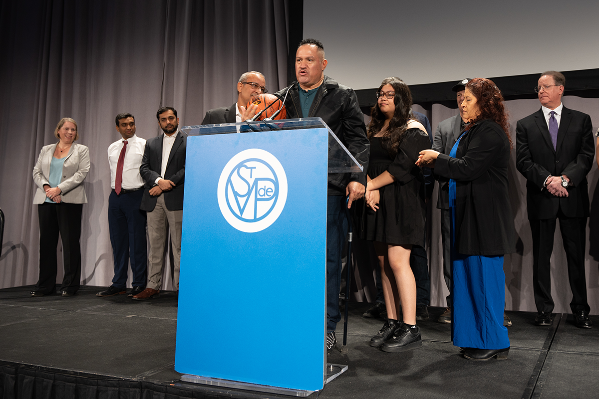 Clinic patient Luis Vidal Rodarte thanks the crowd for making the care possible that saved his life.