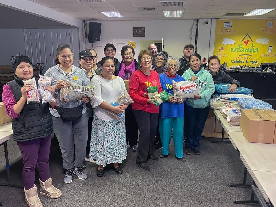 A group of donors poses with the food they collected.