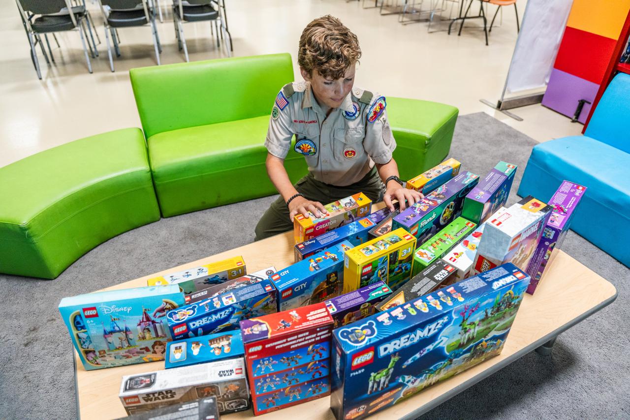 Wilder checks some of the Lego sets he brought to SVdP.