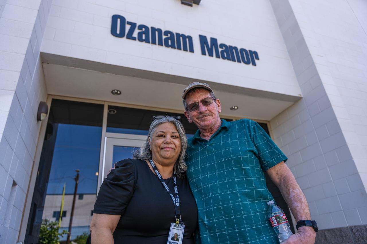 Veteran Christopher Riley stands outside of Ozanam Manor.