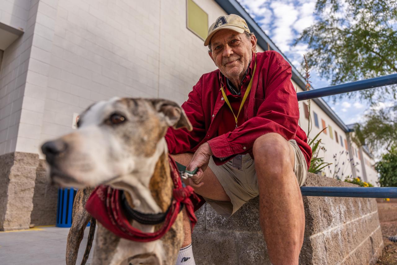 A resident at Ozanam Manor stands outside.