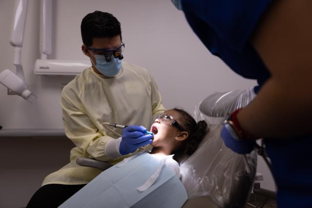 dentist working on a young girl